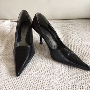 Black pointed toe pumps